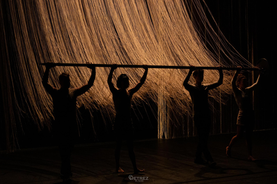 Projection on a versatile string curtain stage backdrop