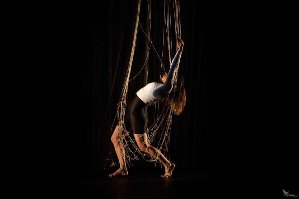 Projection on a versatile string curtain stage backdrop